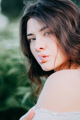 Naklejka premium Young girl in harmony in the summer nature