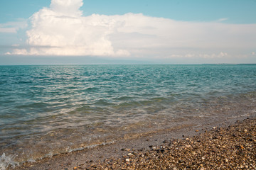 Beautiful seascape. Shining blue water ripple background. Tropical backdrop.