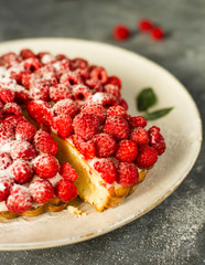 Raspberry cake on gray background