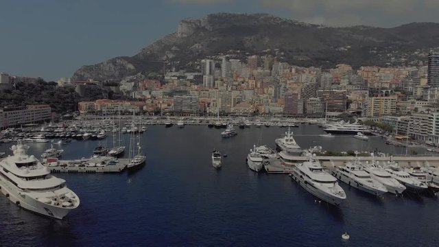 Monaco sea port with Yahts and boats Monte Carlo city France town with houses and casino