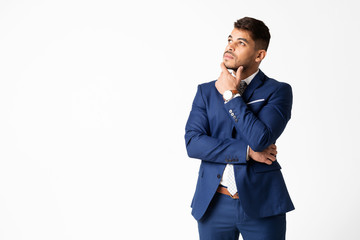 Pensive Arab Business Guy Touching His Chin While Thinking, Isolated