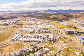 Aerial view of streets, houses and parks in the newly established suburb of Coombs in Canberra, Australia