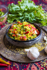 Tabbouleh - Arabic salad with bulgur and couscous, parsley, tomatoes, onion, lemon. 