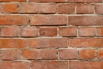 The wall made of red bricks 