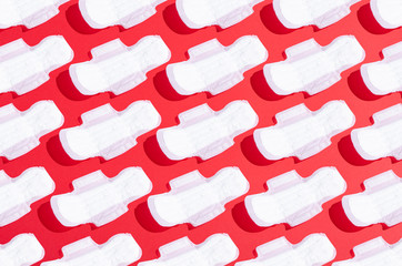 Menstrual sanitary pad napkin set pattern collage on red background