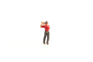 Miniature Person wearing a red shirt while holding an axe standing on a White Isolated Background