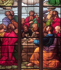 Fototapeta na wymiar Apostles before empty tomb of Virgin Mary, stained glass window in Zagreb cathedral