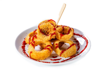 Onion rings with sauce on white background 
