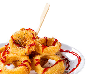 Onion rings with sauce on white background 