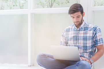 Handsome men are working with laptops. Concept of working and doing business online