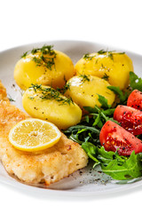 Fried fish with potatoes on white background