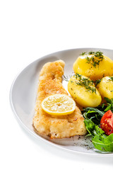 Fried fish with potatoes on white background