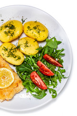 Fried fish with potatoes on white background