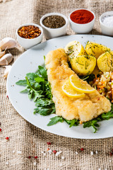 Fish dish - fried fish fillet boiled potatoes and vegetables