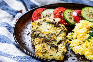 Fish dish - fried cod fillet and vegetables