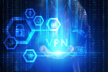 The concept of business, technology, the Internet and the network. A young entrepreneur working on a virtual screen of the future and sees the inscription: VPN