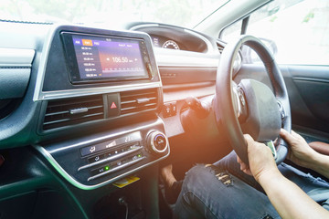 Woman driving car in enjoy holiday retirement life.