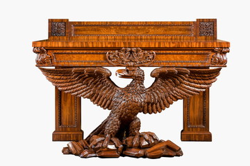 old vintage antique table heavily carved supported by eagle wings spread