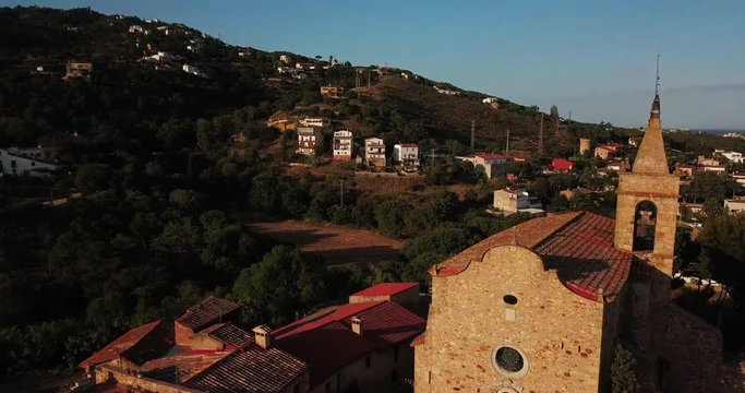 The old Spanish town of Castel de Aro and the Catholic Church