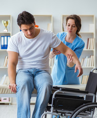 Fototapeta premium Patient undergoing rehabilitation recovery programme with doctor