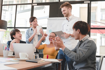 Successful casual business teamwork celebrating at the office,Creative concept.