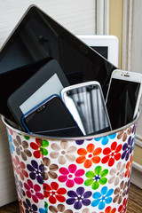 Smartphones and tablets in the trash