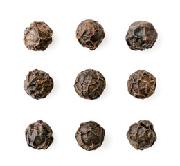 Set of black pepper peas closeup on a white, isolated.