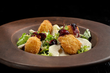 Tasty Homemade Cheese Donuts Jam, poured with pear and salad.