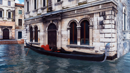 Fototapeta na wymiar Moored venetian gondola on water canal in Venice