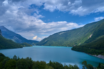 Fototapeta na wymiar Aerial photography. Panoramic view of the lake Molveno north of Italy. Trento region. Great trip to the lake in the Alps.