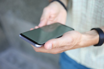 Man using modern cellphone