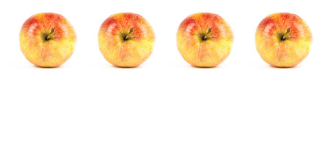 RED AND YELLOW APPLES ON WHITE BACKGROUND