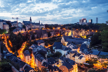 The Skyline of Luxembourg City at night.  The Old Town of Luxembourg is a UNESCO World Heritage Site. Neumünster Abbey, the banks of the Alzette River in the lower city, known as the Grund Quarter.