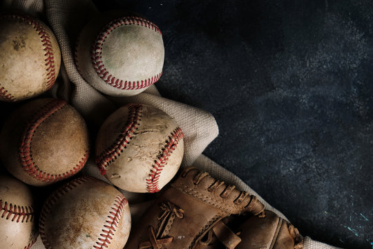 Baseball background with leather glove and balls for sport graphic.