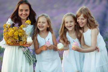 Children eat a cake. Little girl eats a pancake. 