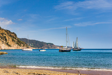 Obraz premium Stationary sailing boats seen from the beach in Costa Brava, Catalonia (Spain)