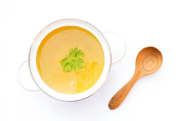 Pot of chicken broth isolated on white background