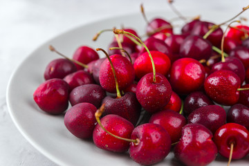 Cherry on a white plate