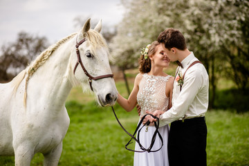 girl and boy with horse
