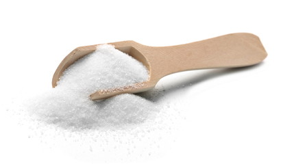 Salt in wooden spoon isolated on white