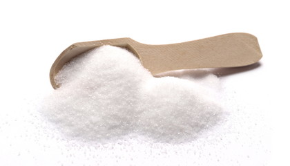 Salt in wooden spoon isolated on white