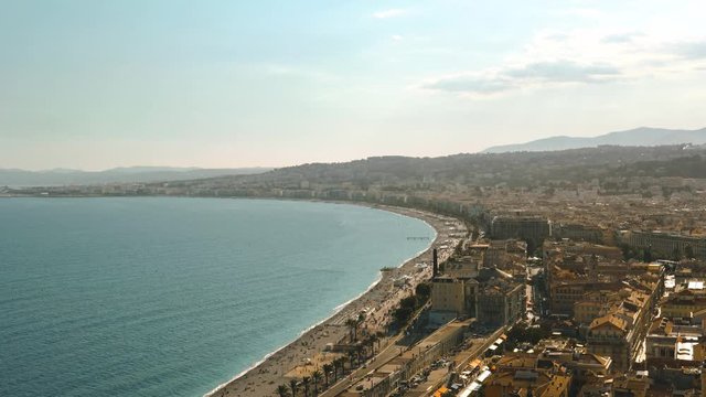 France. Bay of Angels in Nice. Cote d'Azur, view from the mountain. Beaches and palm trees.