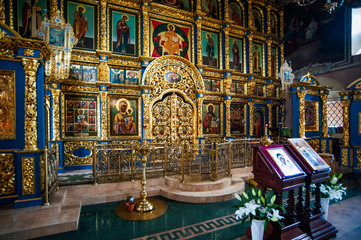 Fototapeta na wymiar In a renovated upper Church all decorations created by contemporary masters. The iconostasis is a wall of several tiers of icons, which is a characteristic belonging of Russian Orthodox churches.
