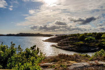 19.05 443. Evening sun over Flekkeroya. Seascape with rocky shores