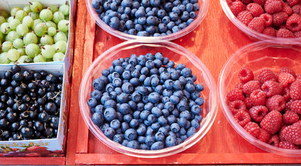 Blueberries and raspberries are for sale in Hötorget's square store