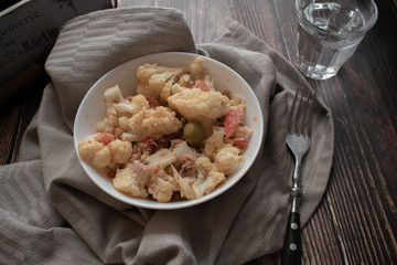 Healthy mediterranean cauliflower salad with tomato