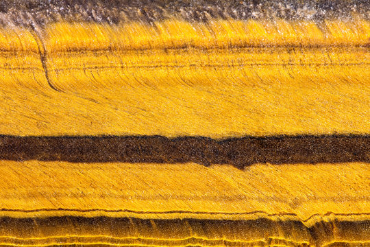 Hintergrund Schichten vom Tigerauge oder Tigerit, Makro Nahaufnahme Mineralien und Heilsteine