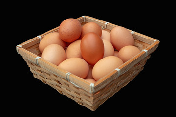 A Basket of Hens Eggs on Black