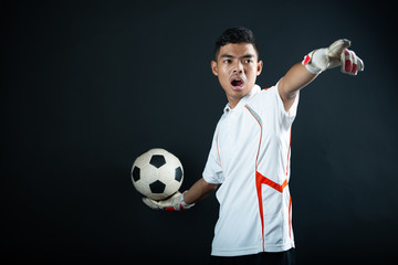 Young goalkeeper soccer man isolated of academy soccer team