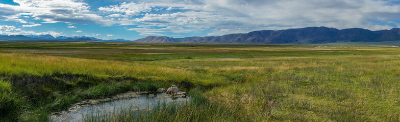 Wild Willy's Hot Spring in Long Valley, Mammoth Lakes, Mono County, California. USA. Natural hot springs from old volcanic activity.